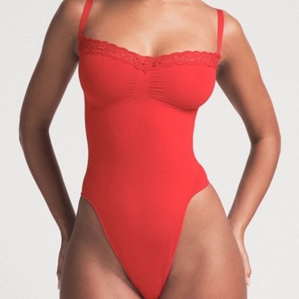 SKIMS Cayenne Seamless Lace Thong Bodysuit